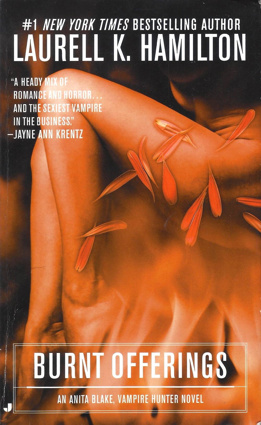 Cover des Buches "Burnt Offerings" von Laurell K. Hamilton